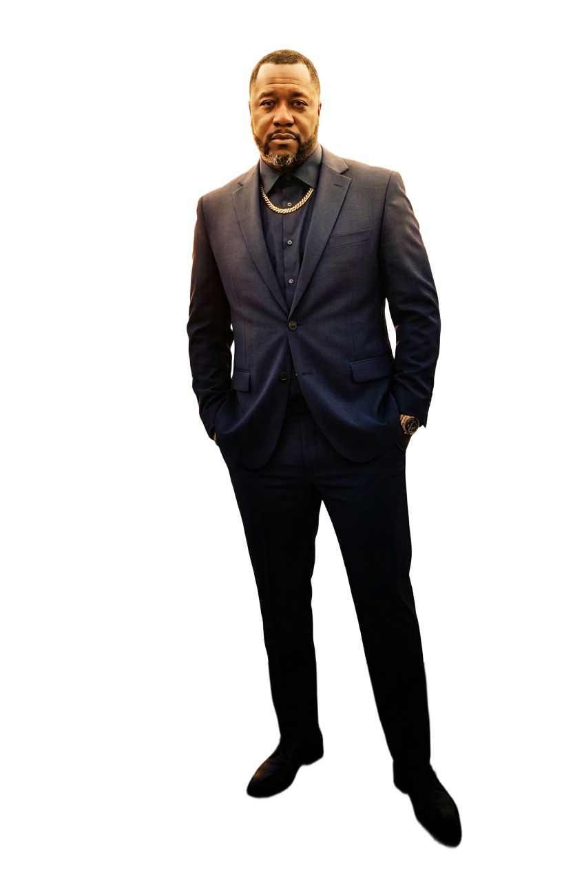 Taj Longino wearing an all-navy blue suit